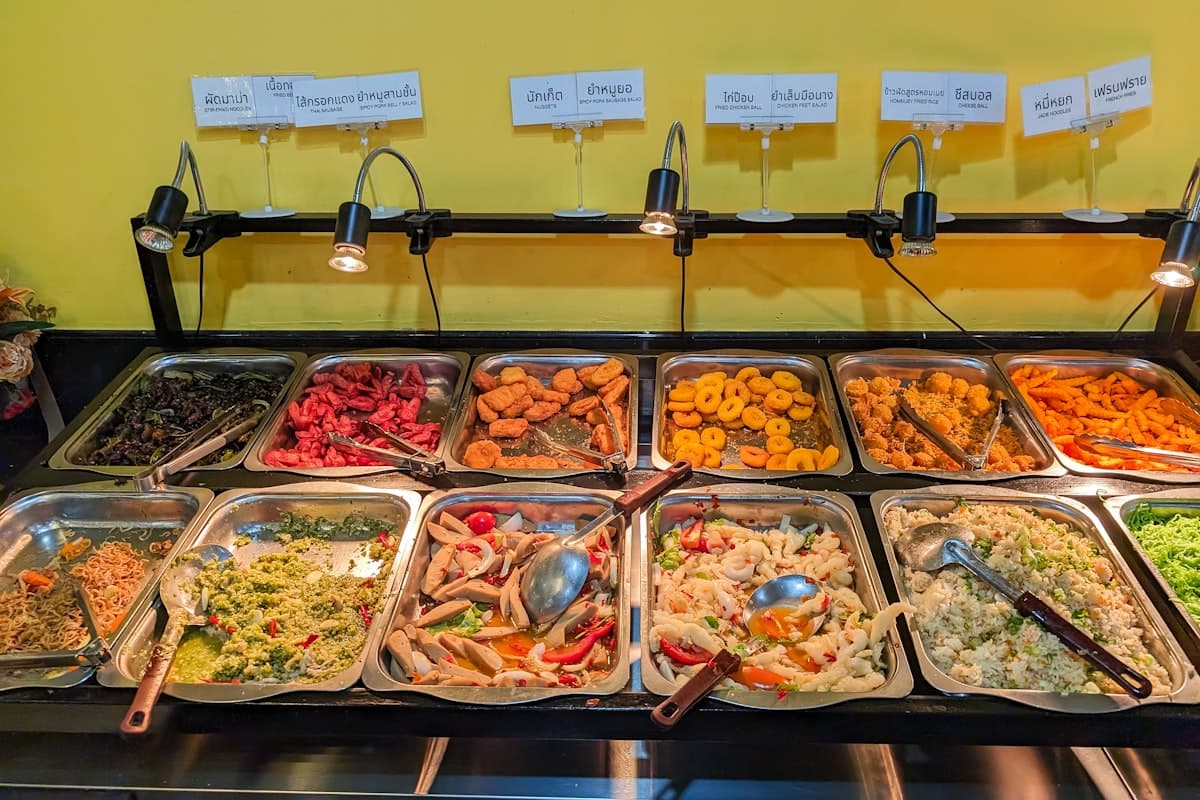 A self-serve buffet spread of dishes, ready for guests to help themselves.